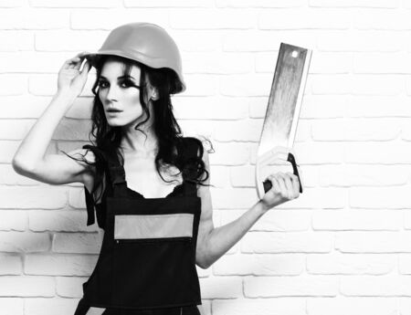 serious cute  builder girlの写真素材