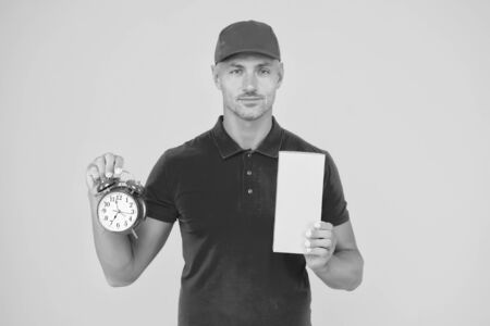 Sale time. Courier hold clock and box. Upcoming sale. Shop and delivery service. Black Friday...