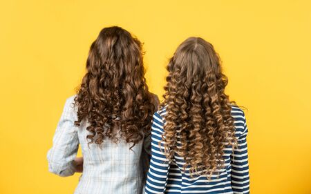 good shampoo or lotion. hairdresser beauty salon. Strong and healthy hair concept. Small children...