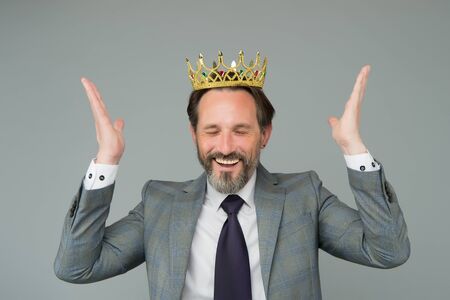 Selfish for success. Businessman wear crown grey background. Career success. Bearded man enjoy success. Professional success. Pride and glory. Successful and ambitious. Take your chancesの写真素材