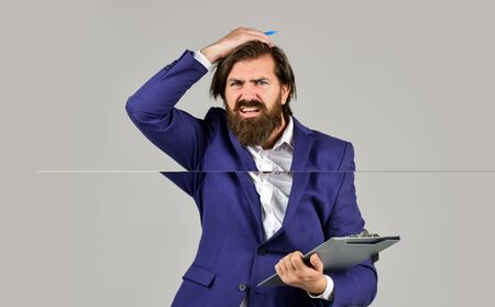 too much work. business process specialist with folder. businessman hold office documents. skilled consultant trainer. man deal with problem. auditor check financial report. amazed business analystの写真素材