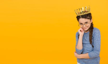 Salon giving you status. Small child wear crown and glasses. Eyewear salon store. Little princess with long hair. Hair salon. Beauty salon. Kids barber. Hairdresser is girls best friend, copy spaceの写真素材