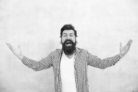 More for me. Man enjoy favorite song. Music is my life. Hipster wear headphones. Inspired by sound. Enjoy music in wireless headphones. Happy bearded man. Music hobby. Such wonderful track playingの写真素材