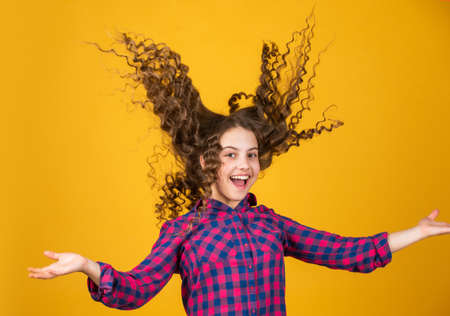 Strong and healthy hair concept. happy girl with long windy hair. healthy and strong hair.の写真素材