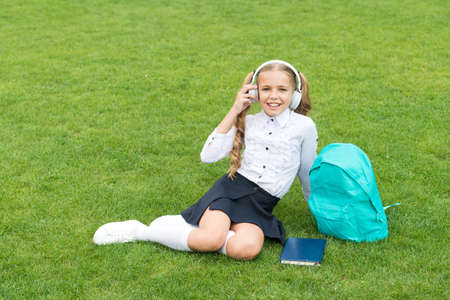 small girl hold book. literature for kids. childhood developing. work with notebook. back to school....