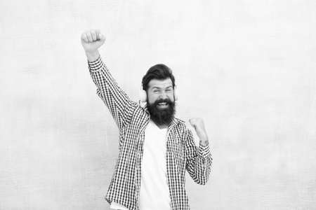 Never opened myself this way. Man enjoy favorite song. Music is my life. Hipster wear headphones. Inspired by sound. Enjoy music in wireless headphones. Happy bearded man. Music hobby. Sing with meの写真素材