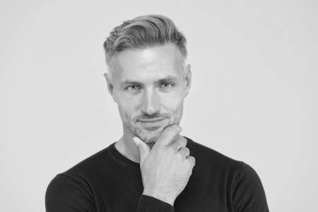 Male portrait concept. Men get more attractive with age. Beauty of mature face. Perfect skin tone. I am just man. Facial care and ageing. Attractive mature man. Mature guy with grey hair and bristleの写真素材