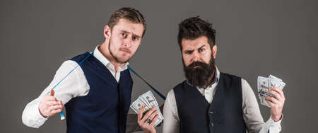 Man with beard on strict face and macho