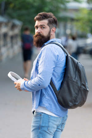 His wanderlust makes him travel. Bearded man go sightseeing. Traveling and wanderlust. Wander and discover. Wanderlust. Desire to explore. Wanderlust is his name. Summer vacationの写真素材