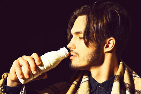 bearded man in plaid