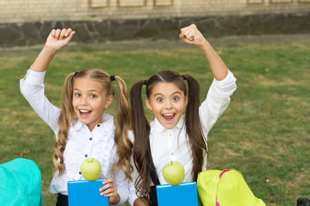 Food knowledge is health power. Happy kids celebrate Knowledge day. Back to school. September 1. School snack. Healthy and energy. Energetic diet. Knowledge and information. Knowledge is brain foodの写真素材