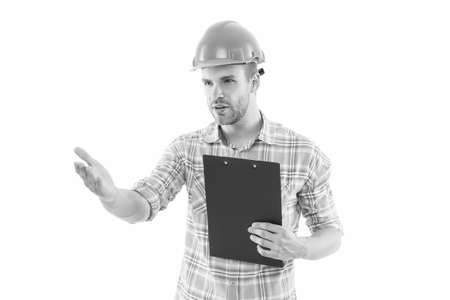 Site inspection. Civil engineer or technician isolated on white. Engineer or architect at work. Construction surveillance engineer in hardhat. Engineering and architecture. Building and constructingの写真素材