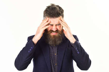 Headache and stress concept. Businessman suffers from headache