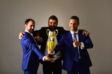 Businessmen wear smart suits and ties. Career and competition concept.
