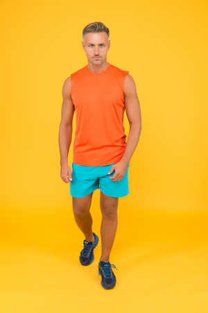 Mature and attractive. Muscular body. Good shape. Strong sportsman in gym clothes. Sportsman...