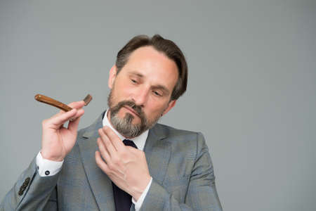 Man shaving straight razor grooming beard, skillful barber conceptの写真素材