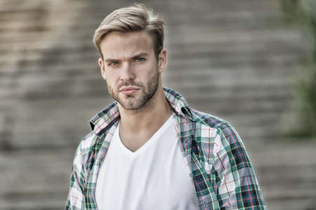Beard stays in fashion. Bearded man outdoors. Handsome guy with unshaven beard hair. Beard barber....