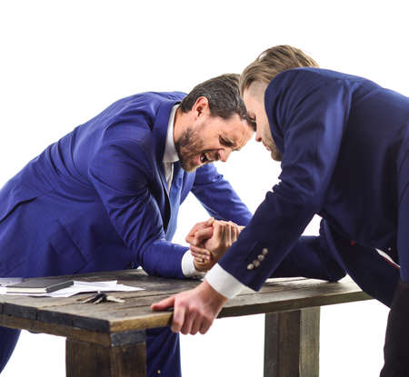 Businessmen fighting for leadership. Business rivalry concept.の写真素材
