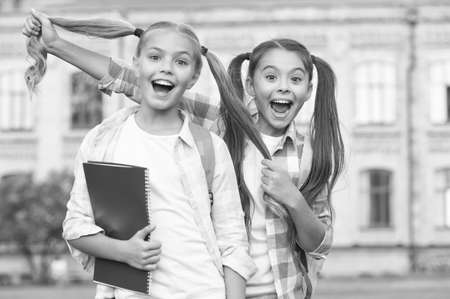 Who says growing hair cant be fun. Happy girls with long healthy hair. Beauty look of school children. Hair salon. Fashion and style. Haidressing and styling. We know hairの写真素材