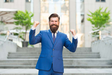 this is just great. Confident and handsome. happy bride groom celebrate success. brutal male beauty. formal and office fashion. successful man in suit. leadership concept. happy boss wear jacketの写真素材