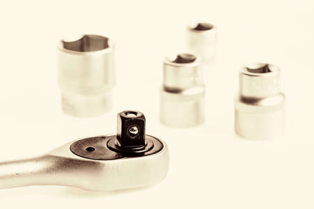 Knob for socket wrench nut ratchet close up white background.