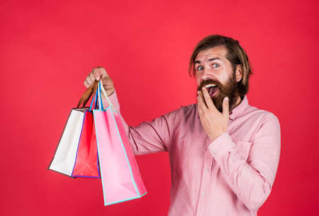 man with package. prepare for holidays. best sale offerの写真素材