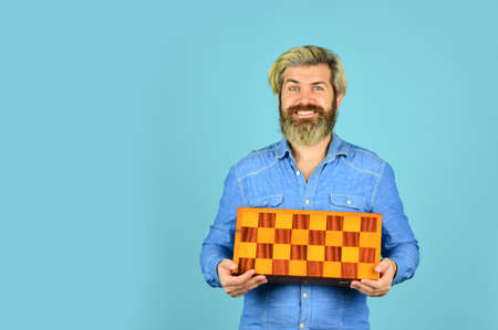 Chess figures. Game strategy concept. Chess lesson. Teacher chess competition. Board game. Man playing chess.の写真素材