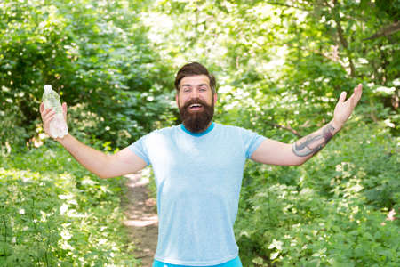 Give Plenty Of Water. sport and fitness clothes. Confident handsome brutal man. brutal caucasian hipster with moustache. Bearded man drink water. ready for camping. male happy tourist feel thirstyの写真素材