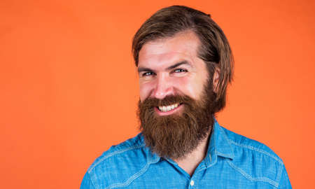 pleasant smile. looking so trendy. Confident and handsome brutal man. bearded man. Young and brutal....