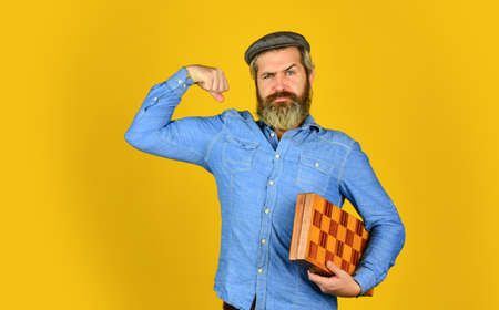 power in intellect. Board logic game. Man playing chess. back to school. chess pieces and board. competition success play. strategy, management or leadership concept. Playing chess on the Boardの写真素材