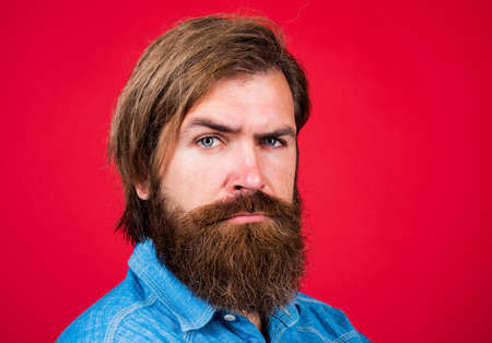 Mature hipster with beard. brutal caucasian hipster with moustache. Male barber care. Bearded man. Hair and beard care. Confident and handsome brutal man. Facial careの写真素材