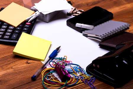 Business and work concept. Office tools on wooden background