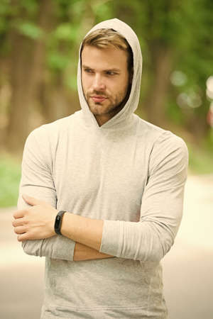 seriousness and masculinity. sportswear fashion. sportsman relax after training outdoor. handsome...