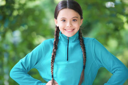 Girl wear fleece jumper for active leisure nature background, summer vacation concept