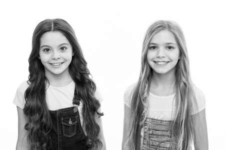 Natural beauty. Healthy and shiny hair. Kid cute child with long adorable hairstyle. Hair care tips and professional treatment. Long hair feminine attribute. Girls usually let their hair grow longの写真素材