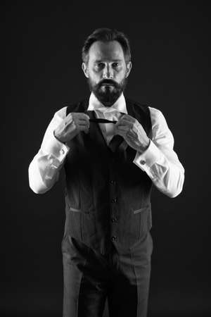 Classy style. Man bearded guy wear white shirt and classic vest outfit. Formal outfit. Elegant outfit mature man. Take good care of your silhouette. How to dress for your age. Elegancy and male styleの写真素材