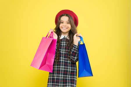 Black friday. Sale discount. Shopping day. Child hold package. Favorite kids brand. Girl with...