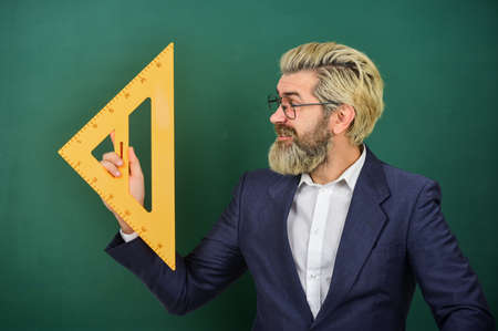 Passionate about math. Mathematics and people concept. Mathematics favorite subject. Man teacher use...