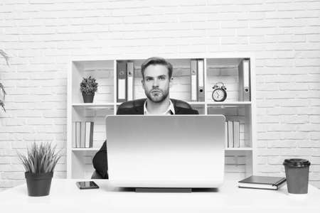 Investor focusing on potential return of growth. Economics recession and recovery. Financial expert man work with laptop. Broker trader stock market concept. Financial investment Cryptocurrencyの写真素材