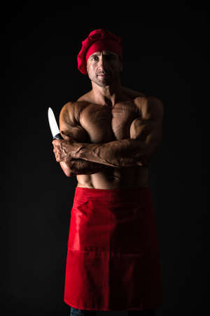 Man attractive nude chef wear apron. Sexy muscular chef black background. Attractive chef cook. Muscular chef bodybuilder. Sport diet. Delicious recipe. Sexy macho cooking. I will make it tastyの写真素材