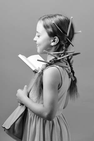 Back to school concept. School girl with happy smiling faceの写真素材