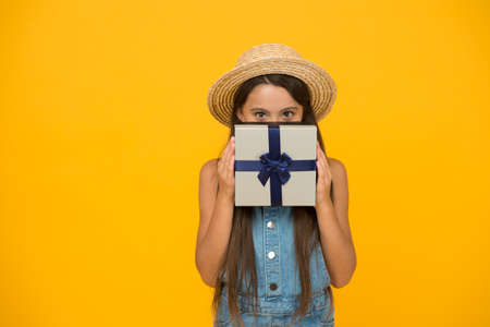 Boxing day deals are here. Small child hold gift box. Boxing day. Boxing day shopping. Wrapped pack. Present package. Parcel delivery. Holiday celebration. Keep celebrating with Boxing dayの写真素材