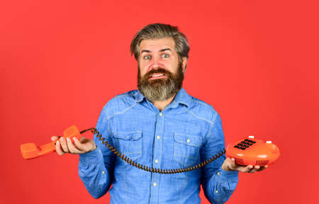 Bearded man phone conversation.の写真素材