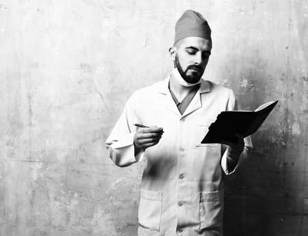 Doctor at work. on beige background with copy spaceの写真素材