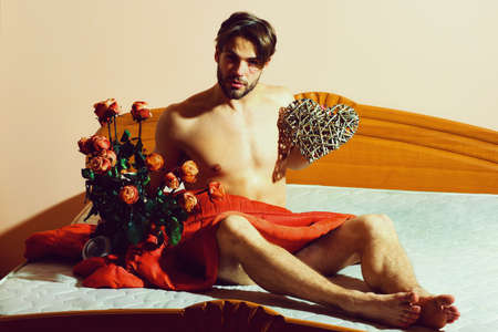 bearded macho man with roses