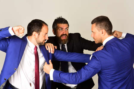Man with beard and scared face tries to settle dispute.の写真素材