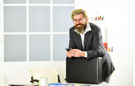 investment in yourself. businessman with office bag. successful bearded man got lot of money. he make dollars. confident millionaire. economy and finance. rich bank workerの写真素材