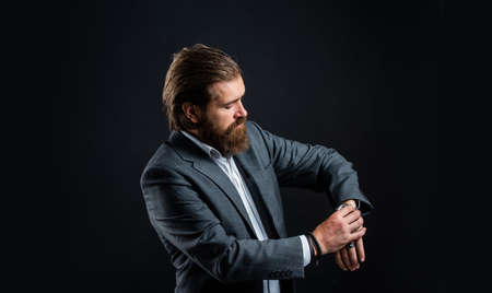 Wristwatch businessman wrist formal suit accessory, what time is it conceptの写真素材