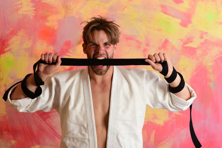 Man with wild face and bristle on colorful background