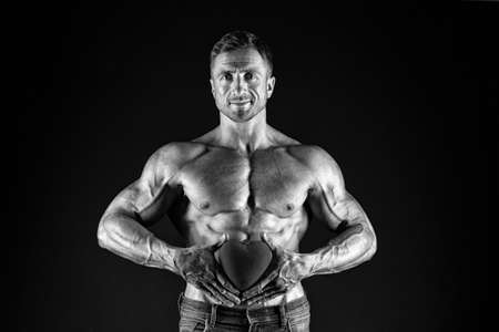 love date. bodybuilder man share his heart. i lay my love on you. valentines day. Valentines day sales. World heart day. I will be your Valentine. sexy macho man with muscular body. secret attractionの写真素材